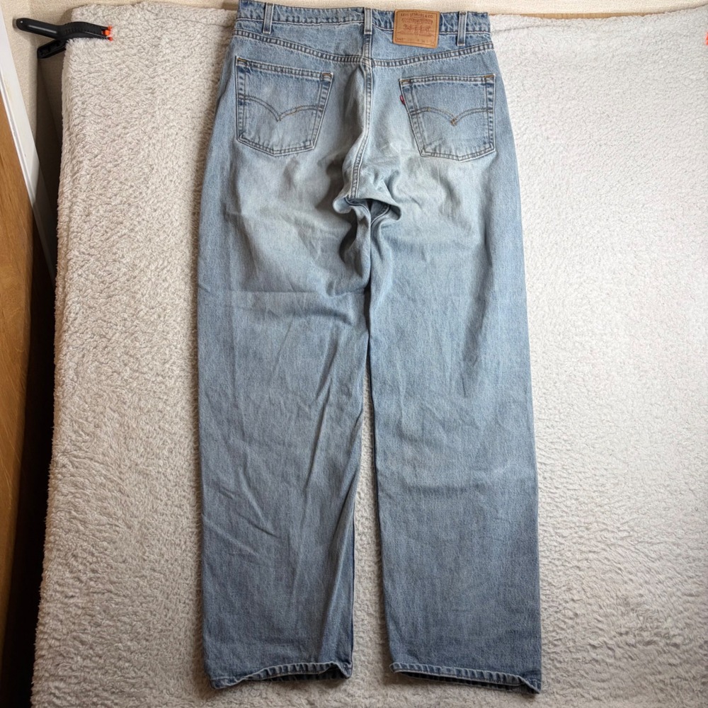 Vintage Levis 565 Loose Fit Wide Leg Jeans 36x34 Light Wash Made in USA 1996